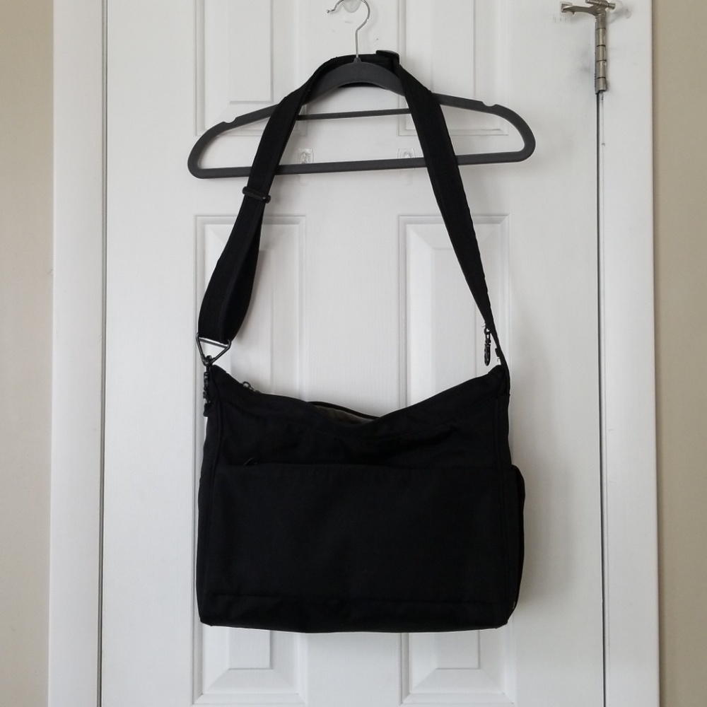 Pacsafe messenger travel bag